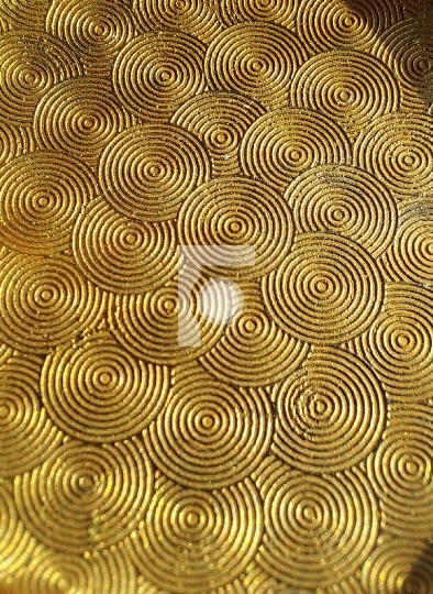 Abstract Background - Golden coloured metal circles