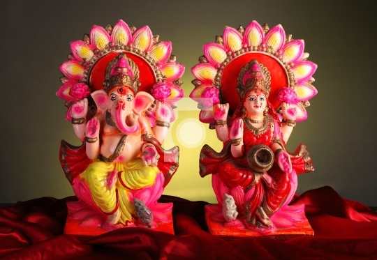 Beautifully Decorated Lord Ganesha and Goddess Laxmi Idols / Sta