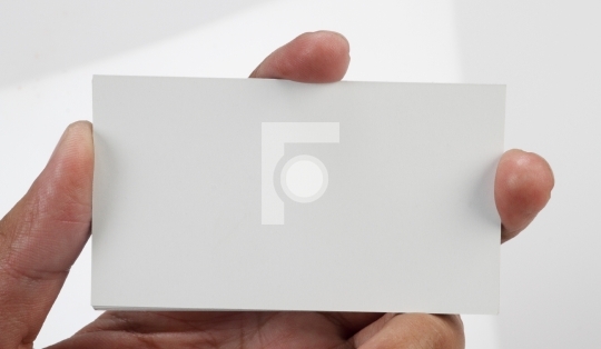 Blank Business Card for Mockup in a Hand Free Photo
