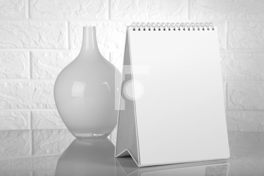 Blank White Calendar for Mockup with a Flower Vase