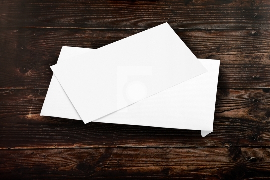 Blank White Envelope Mockup with a Invitation Card on Wooden Bac