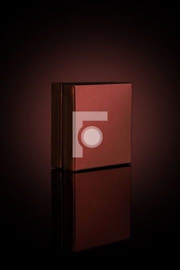 Brown Box for Mockups Isolated on Dark Background
