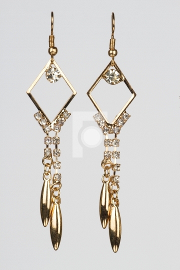 Dangle Golden Earrings Jewelry Free Stock Photo. Free for commer