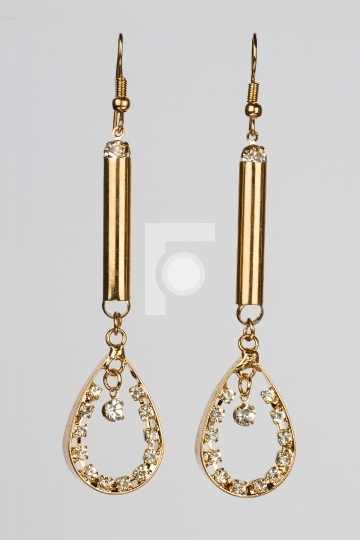 Dangle Golden Earrings Jewelry Free Stock Photo. Free for commer