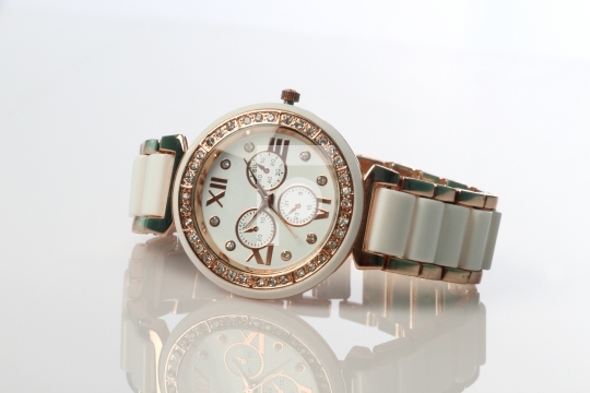 Diamond Studded Wrist Watch On White Background
