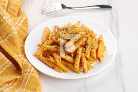 Food - Delicious Penne Pasta Plate with a Fork on White Marble B