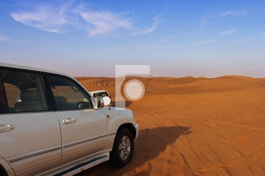 four wheeler in desert, dubai, united arab emirates