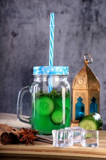 Fresh Cucumber Juice in a Mason Jar with star anise and cinnamon