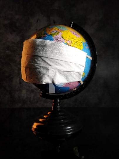 Globe / World with a Mask for Corona Virus COVID19 Prevention - Free Stock Photo