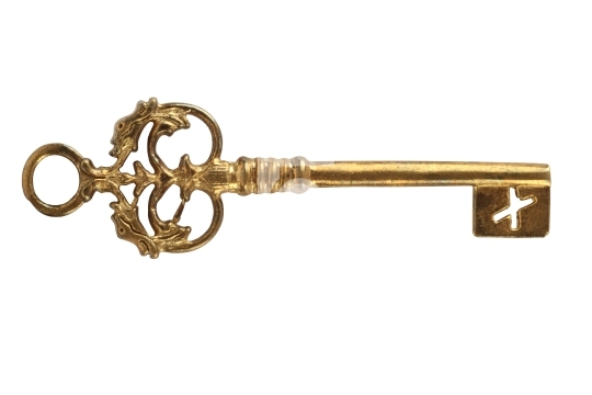 Golden Antique Key on white background