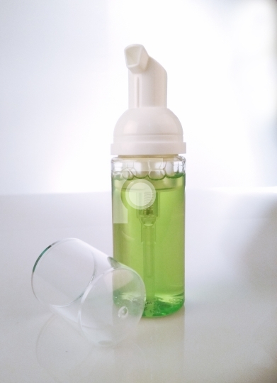 Green Cosmetic Product Pump Bottle for Mockup Free Stock Photo