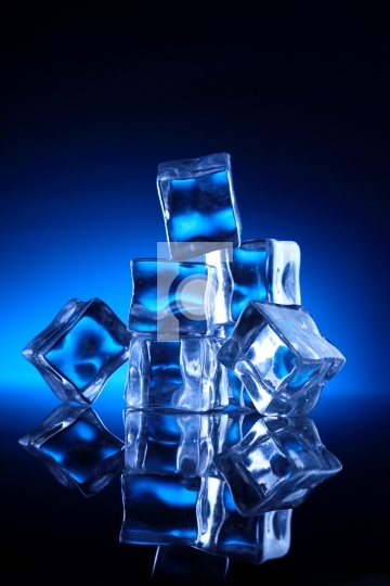 Ice Cubes Stacked up on Blue Background