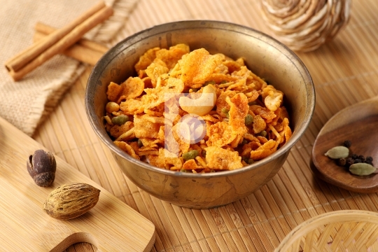 Indian Snacks Cornflakes Namkeen Food in an Antique Brass Bowl