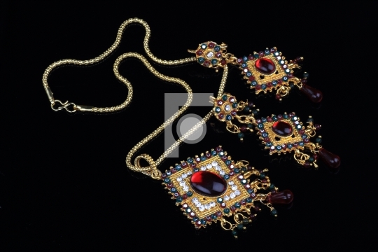 Intricate Indian Gold Jewelry On Black Background