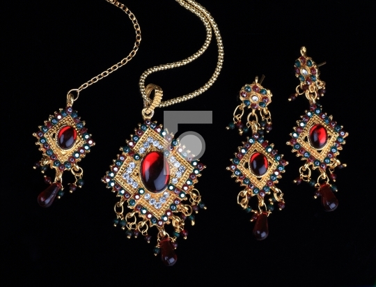 Intricate Indian Gold Jewelry On Black Backgrounds