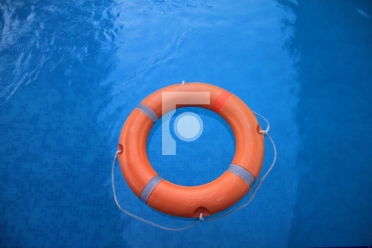Lifebuoy in Blue Water - Safety Measures Free photo