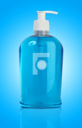 Liquid handwash soap in blue background