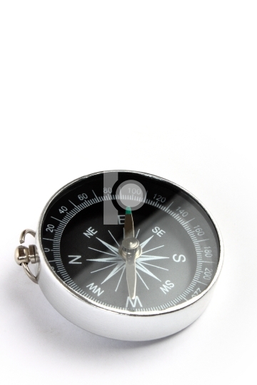 magnetic compass closeup on white background