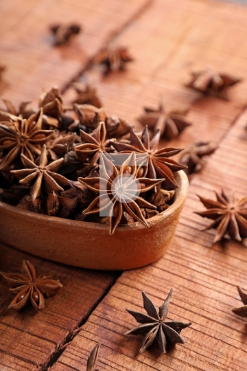 Organic Indian Spice / Herb Star Anise in a Brown Bowl