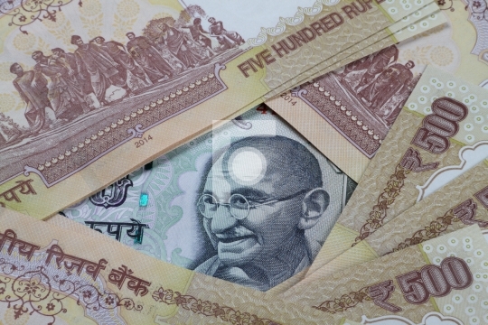 Rupee 100 Note in between demonetized 500 INR Notes