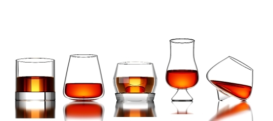 Set of Scotch Whisky, bourbon or rum in a Glass on White backgro
