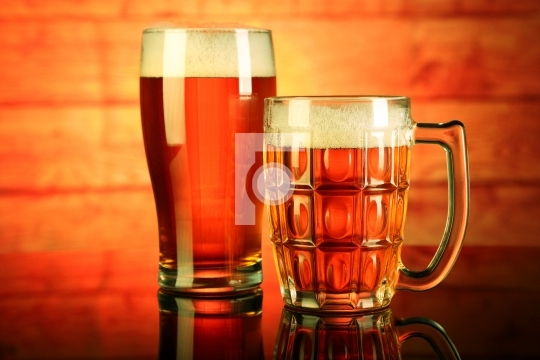 Two Beer Mug / Glass with froth with reflection